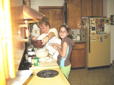 The People
Laurel Higham and (in back) Aunt Mary Higham Glazer prepare food for picnic.
