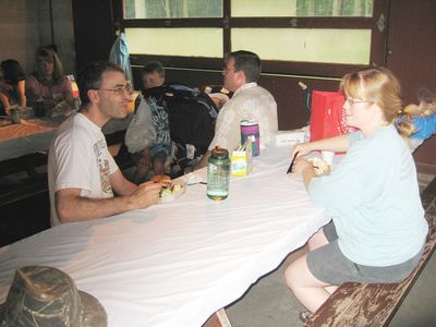 The Glazers
L to R: Mark Glazer; (background) Eli Glazer in baby carrier, and Joe Higham; Mary Higham Glazer
