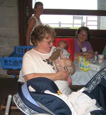 Great Aunt Betty and Eli
L to r: Betty Higham Sauerzopf holding eli Glazer; Ann Higham Hughes and Susan Higham Foley look on.

