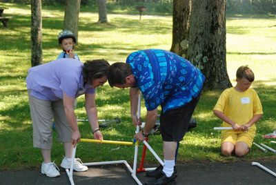 Reunion 2010
Sue and Joe try to get the game figured out.  Sam Hughes (background) and Joe Hughes help.
