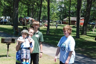 Reunion 2010
Eli Glazer in the arms of Laurel Higham.  Riley Hughes and mom, Mary Higham Glazer, watch.
