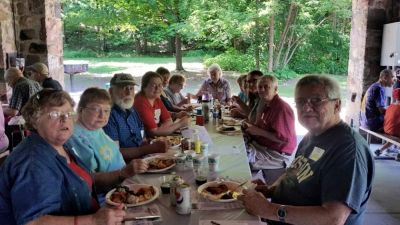 2015 Family Reunion, July 11, 2015
L to R: Mary Smith Taglieri; Betty Higham Sauerzopf; Bob Sauerzopf; Florie Parmelee; Miriam Smith Parmelee; Chris Curtiss-Rivers; Jane Curtiss Watkin; partially hidden, Evelyn Grinnel Smith and Dave Smith; Sheri Smith Diefenbacher; Clive Diefenbacher; Richard Taglieri 
