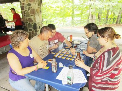 2017 Family Reunion, July 8, 2017
Parmelee Family at Board Game.  
ClW: Miriam Smith Parmelee; Jim Parmelee; Nate Parmelee; Dave Wendell; Abigail Parmelee (Missing from game: Florie Parmelee)
