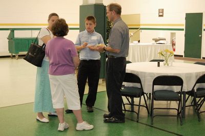 Sunday Party at OLS School
Guests: (back to camera) Sue Higham Foley chats with Ginger Smith, Andrew Smith, and Garret Smith
