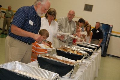 Sunday Party at OLS School
Food:  Buffet ready.  Bob Sauerzopf; Jeffrey Yuelling; Cathy Yuelling; Jay Yuelling dig in.
