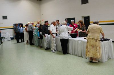 Sunday Party at OLS School
Food. Buffet:  The line grows.

