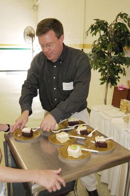 Sunday Party at OLS School
Cake: Joe Higham serves cake.
