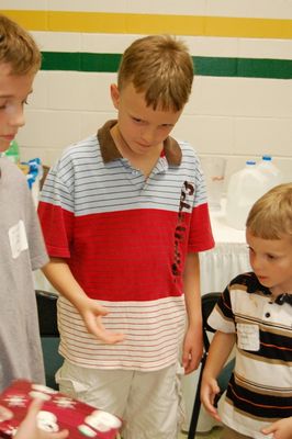 Sunday Party at OLS School
Games: Joe Hughes receives his gift.
