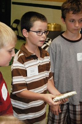 Sunday Party at OLS School
Games: Thomas Higham receives his gift.
