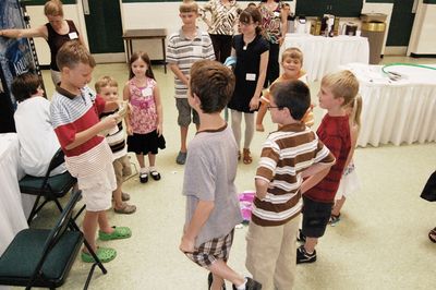 Sunday Party at OLS School
Games: Joe Hughes opens his gift.
