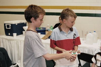 Sunday Party at OLS School
Games: Tyler Entwistle and Joe Hughes distribute gifts.
