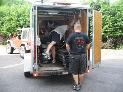 Friday/Saturday Breakfast and Picnic
The catering Foley trailer gets unloaded by Ted and Andy.
