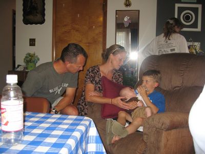 Friday/Saturday Breakfast and Picnic
Picnic: Ben and Ann Hughes watch as Sam feeds Eli.
