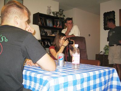 Friday/Saturday Breakfast and Picnic
Picnic: Andy watches as Rachel takes more pix.  Ted Foley and Ben Hughes (background) in Living Room. 

