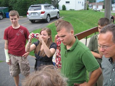 Saturday Church 2
Church 2: Family look on as Jan opens family gift
