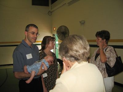 Sunday Party at OLS School
Guests: Mark, Eli and Mary Higham Glazer greet Echo Road neighbors Louisa Matula (back to camera) and Jo Jennings
