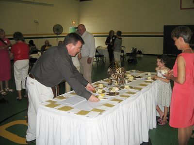Sunday Party at OLS School
Cake: Joe Higham serves cake, watched by Silvi Howey and Peg Higham
