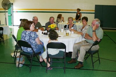 Sunday Party at OLS School
Tables: L to R: Lynelle Howey; Nancy Stanley Howey; Fred Howey; Stu Tillis; Marion Schoonhover Tillis; Jo Jennings; Kent Jennings; Silvi Howey (back to camera)
