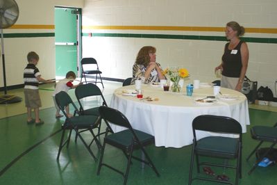 Sunday Party at OLS School
Tables: Jane Higham; Ann Hughes (Sam Hughes and Cole Entwistle with hoop) at left
