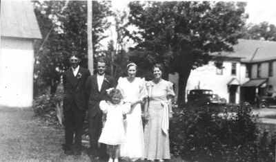 Smith / Higham Family
Nellie Higham Smith and Merritt Smith
Wedding Photo, August 15, 1935, Westdale, NY
L to R: George Humphrey (according to Dave); Merritt Smith; Nellie Higham Smith; Mrs. Humphrey (first name not known, according to Dave);
Front: Miriam Ruth Smith (Age 8 at the time.  Probable flower girl?)
