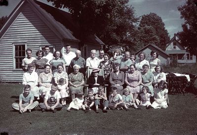 Seubert / Costello / Higham/ Smith Family
Family Reunion at Costello Home, Camden, Sunday, August 15, 1948 as per diary of Mary Seubert Higham.  She reports 39 attending.  34 in the photo, plus the photographer.  
(Missing: Don Seubert, George Costello and three more.  Possibles: Patricia Anna Seubert; Richard Karl Seubert; David Christopher Burch)
Front: Bill Smith; Jack Higham; Mary Elizabeth Burch; Raymond Donald Burch; Steve Smith; Dave Smith; Roberta Smith; Ruthanne Smith; Betty Higham;
Seated: Virginia Seubert Burch; Mary Seubert Higham; Julia Seubert Costello, holding Diane Costello; Cora Clark Costello, (Gerald's mother); Florence Ward Seubert, (Virginia's mother); Unkn woman; Alice Higham; Magdalena Fauser Seubert; Anna Shephard Costello, holding Michael David Costello?;
Standing: Merritt Smith; Mary Lou Costello Maynard; Bill Maynard; Nellie Higham Smith; Don Burch; Ray Higham; Gerald Costello; Paul Seubert; Mildred Walker Higham; Mary Arma Smith held by Ralph Smith; Marie Scoville Seubert; Jane Higham Smith; Barbara Costello
Photo taken by Wilfred Higham, using early Kodachrome cut film
