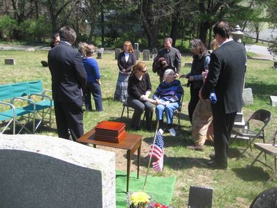 John Higham Mack Funeral
Attending and pictured from the left: Funeral Director from the Lasher Funeral Home; Christina, volunteer caregiver and neighbor of Jean Mack Robeson, sister of John Mack; (back to camera) Miriam Smith Parmelee; (partially hidden) Janet Mack Higham; Mary Higham Glazer; Joseph Higham; Lois Mack McLeod; (partially hidden) Nancy Mack Nelson; Colin Nelson (with flag);
Seated, L to R: Dael Nelson Harrison; Jean Mack Robeson;
Not pictured: Richard Nelson; Bennett Harrison; Jack Higham (photographer)
